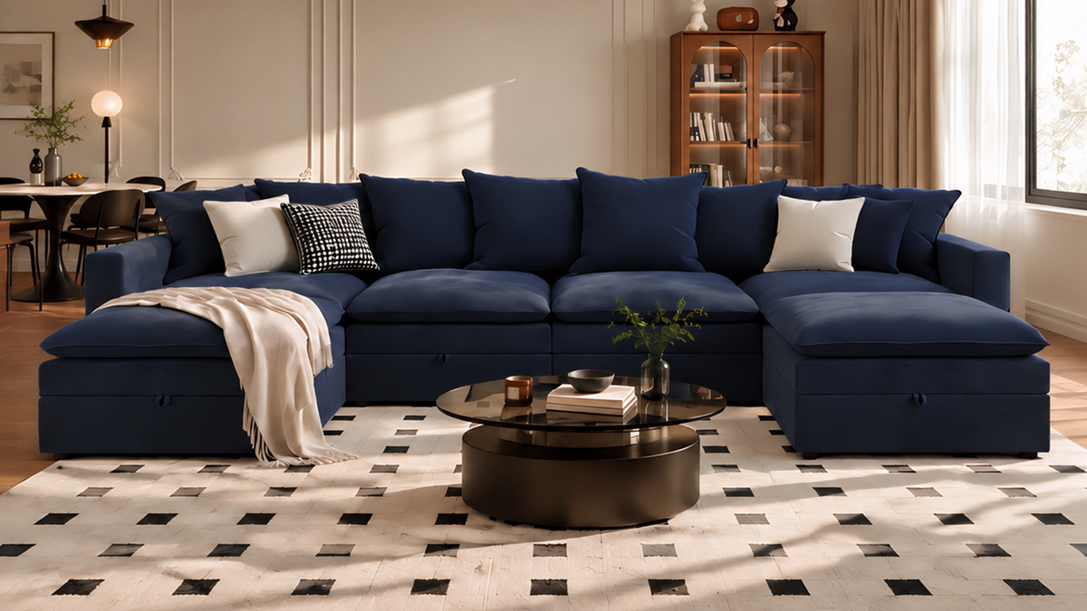 Opua 6-piece corduroy cloud sleeper sectional in navy blue with chaise and oversized cushions, styled in a modern living room.