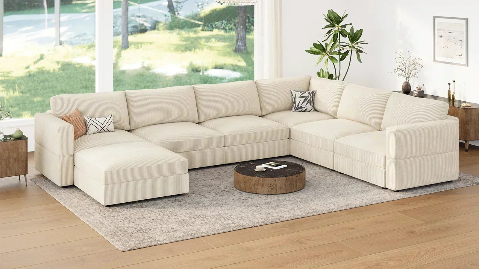 Cream modular U-shaped sectional sofa with ottoman in a bright living room, illustrating how to measure space for a modular sleeper sectional.